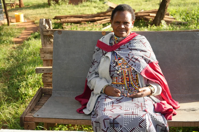 Emma Sintent seated outside her home in Namuncha Ranch, Kenya.